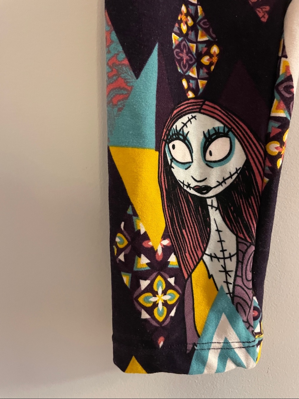 LuLaRoe Kids Geometric & Character Print Leggings in Black, Yellow, Teal & Pink - Picture 3 of 10